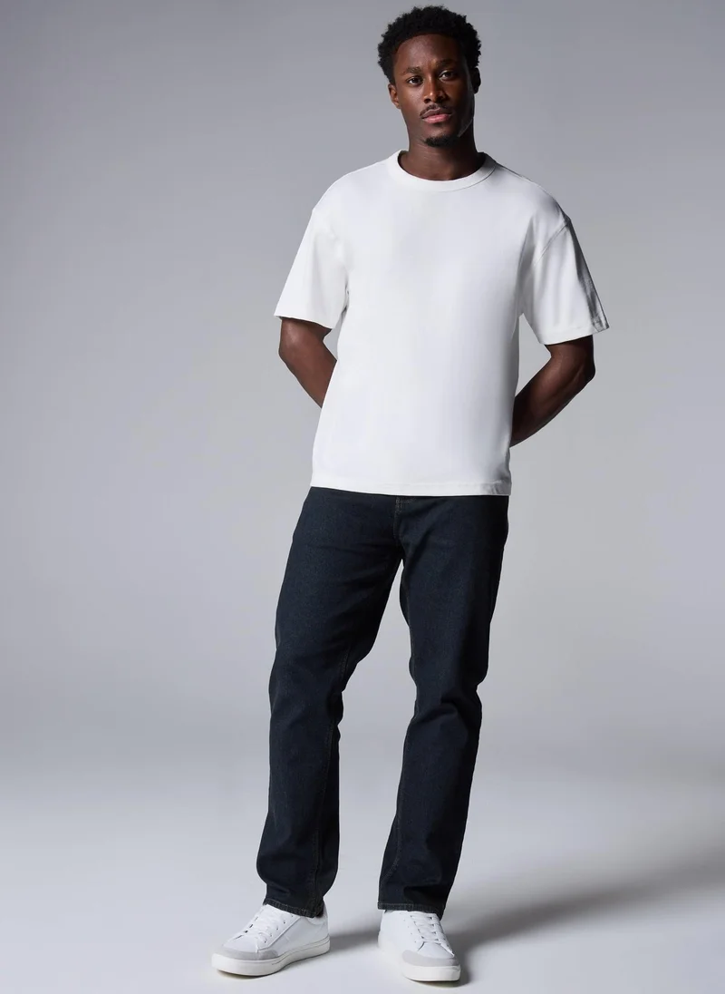 ماتلان جينز سكيني داكن بقصة عادية